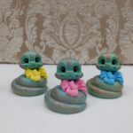 Price and Buy Adorable Snake Figurines with Bows for Nowruz 1404