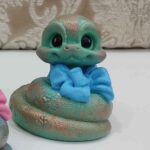 Price and Buy Adorable Snake Figurines with Bows for Nowruz 1404 - Image 4