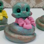 Price and Buy Adorable Snake Figurines with Bows for Nowruz 1404 - Image 5