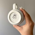 Price and Buy Artistic Ceramic Cup – Handcrafted with White Bird and Flower Painted Design - Image 4