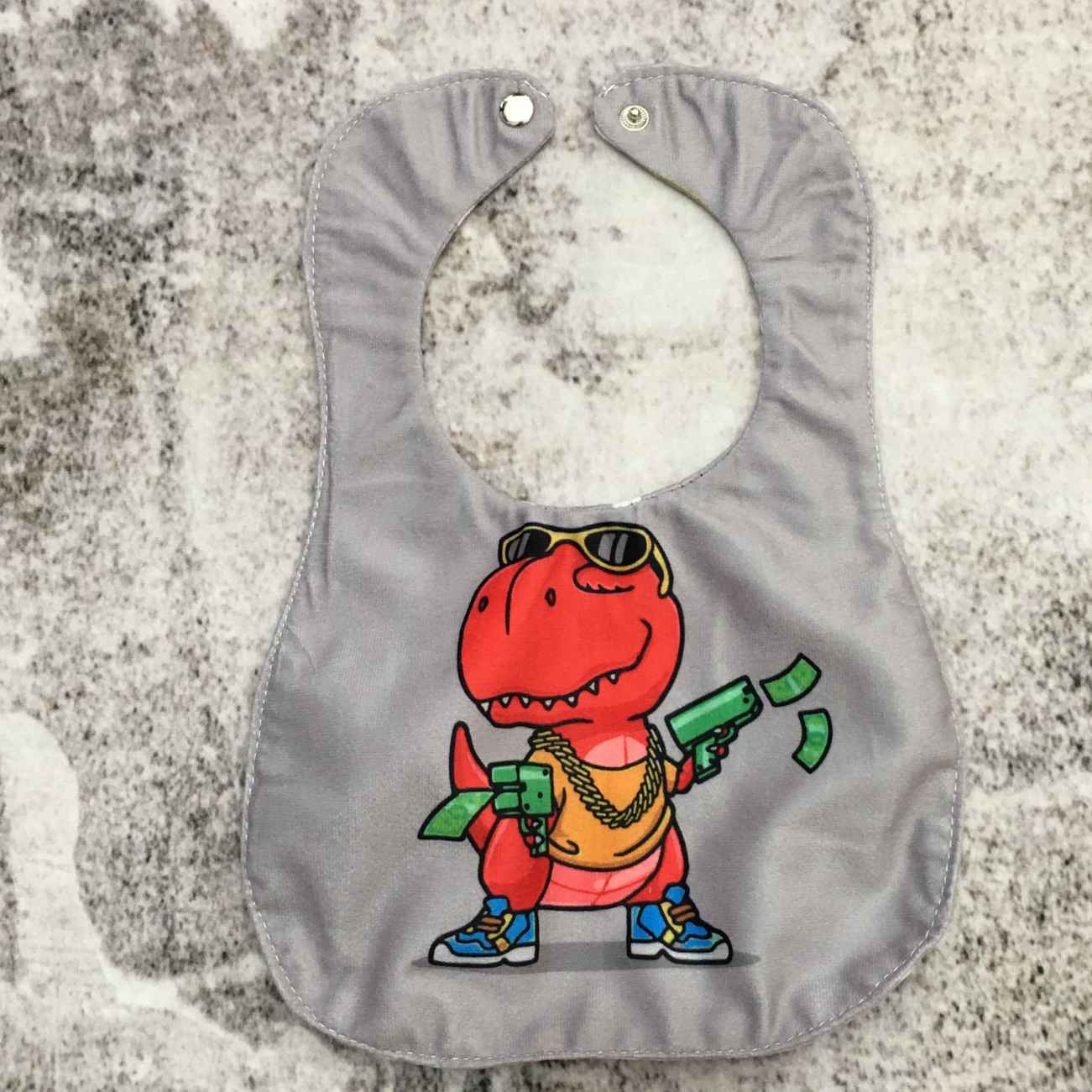 Price and Buy Baby Bib Gangster Dino Dinosaur Pattern with Snap Closure_6902384824285.jpeg Price and Buy Baby Bib Gangster Dino Dinosaur Pattern with Snap Closure - Image 1