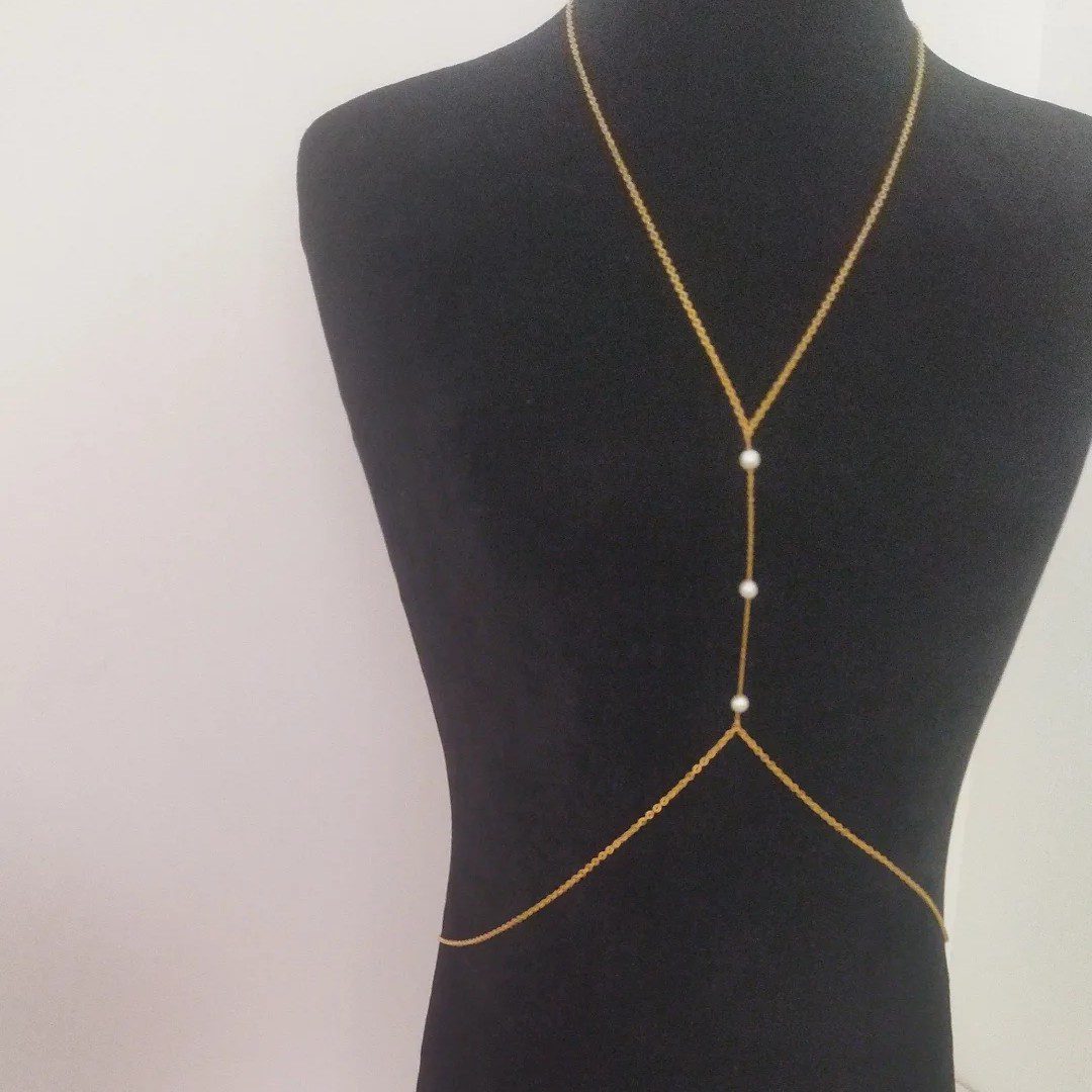 Price and Buy Body Chain in Pearl Design – Suitable for Photoshoots and Bold Styling_6902aa755d2a4.jpeg Price and Buy Body Chain in Pearl Design – Suitable for Photoshoots and Bold Styling - Image 1