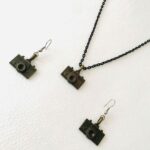 Price and Buy Bronze Drop Jewelry Set with Unique Camera Design
