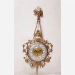 Price and Buy Charming Brass Wall Clock with Decorative Floral Accents and Hanging Detail