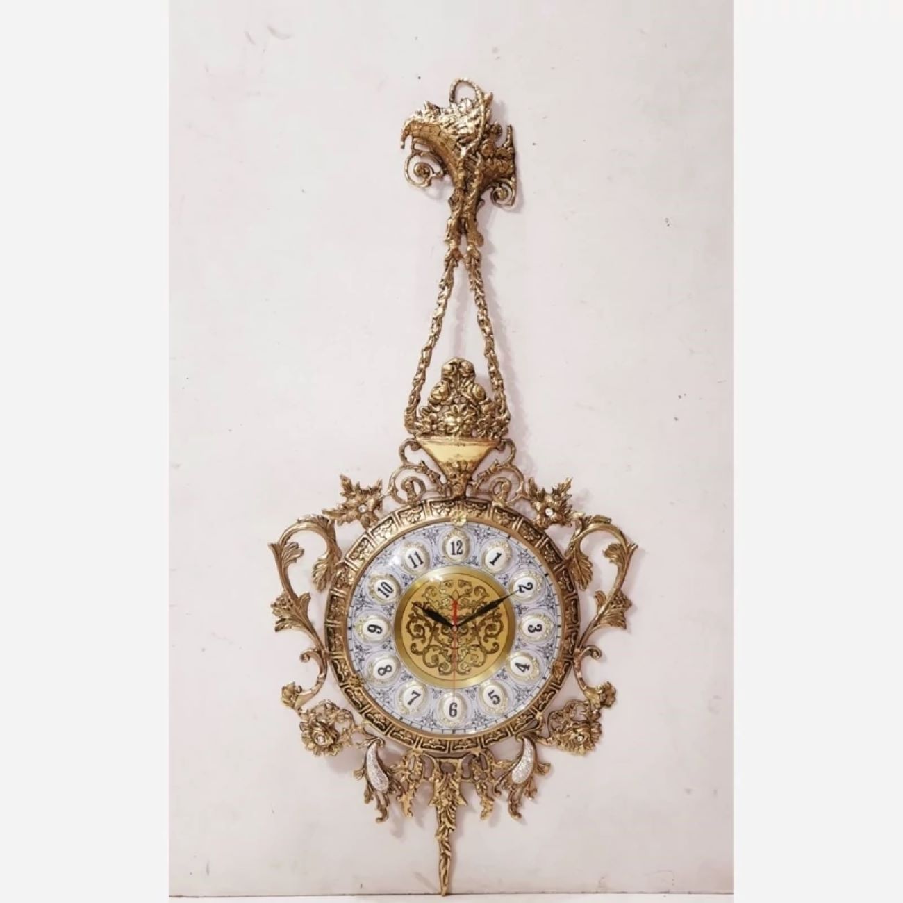 Price and Buy Charming Brass Wall Clock with Decorative Floral Accents and Hanging Detail_6902efa8731fa.jpeg Price and Buy Charming Brass Wall Clock with Decorative Floral Accents and Hanging Detail - Image 1