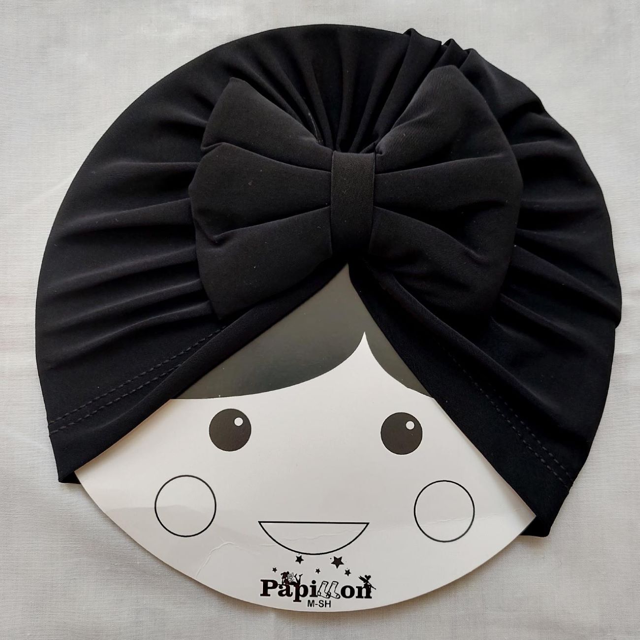 Price and Buy Cute and Stylish Baby Turban with a Black Bow Tie – Soft & Warm to Protec Baby_6901ae70227a1.jpeg Price and Buy Cute and Stylish Baby Turban with a Black Bow Tie – Soft & Warm to Protec Baby - Image 4