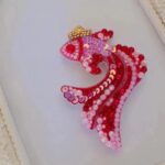 Price and Buy Elegant Beaded Fish Brooch: A Splash of Charm