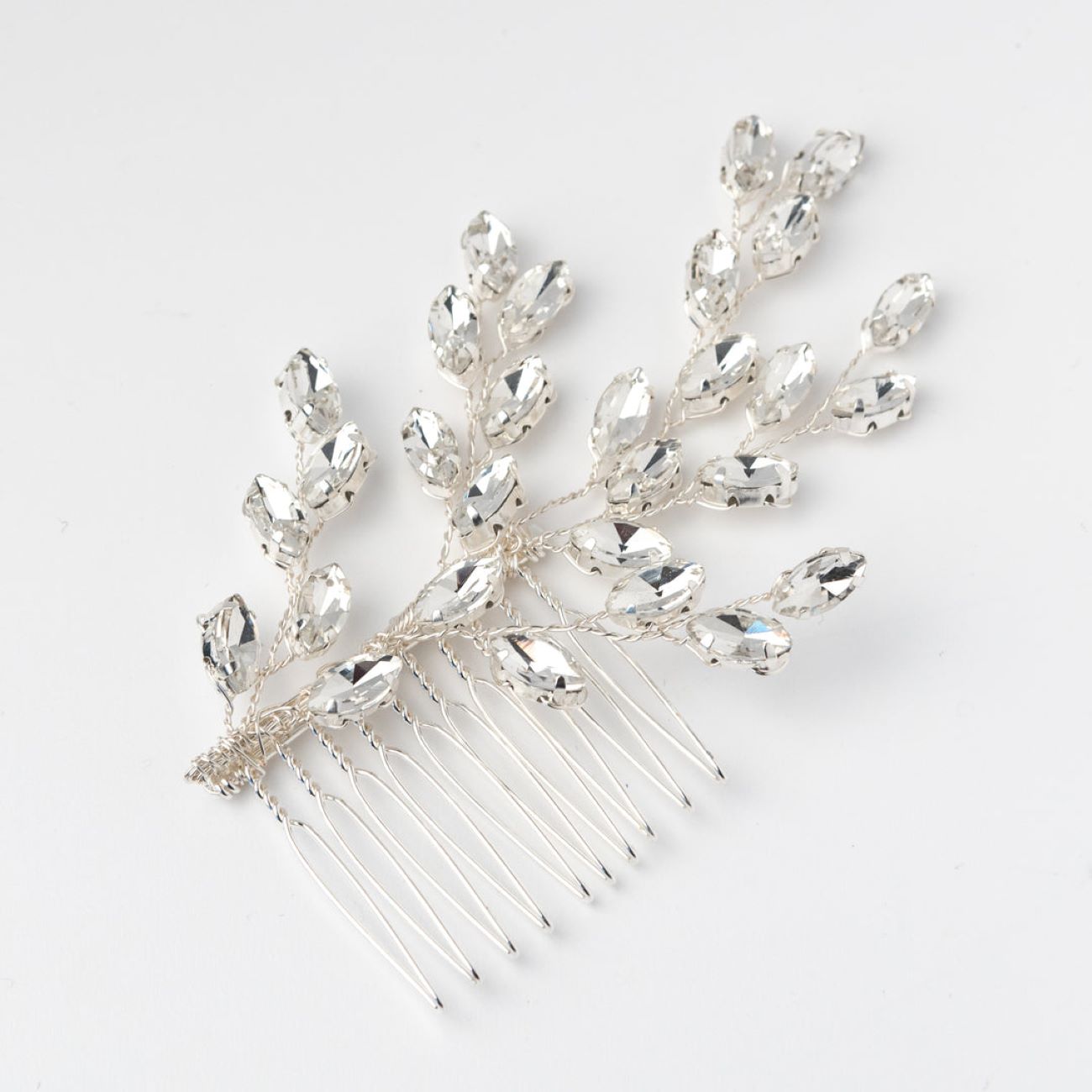 Price and Buy Elegant Metal Hair Comb Clip with, Leaf Gemstone Design – 2 Pcs_69031cc780955.jpeg Price and Buy Elegant Metal Hair Comb Clip with, Leaf Gemstone Design – 2 Pcs - Image 1