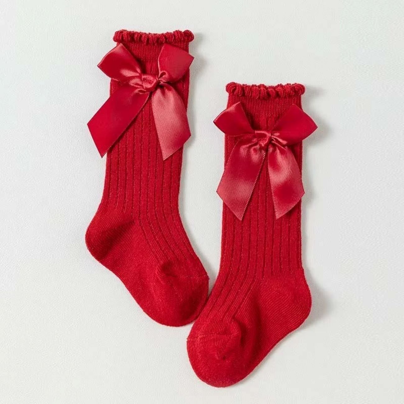 Price and Buy Girls’ Long Dress Socks with Bow – Premium Quality Red Cotton_6902b1d2a1876.jpeg Price and Buy Girls’ Long Dress Socks with Bow – Premium Quality Red Cotton - Image 3