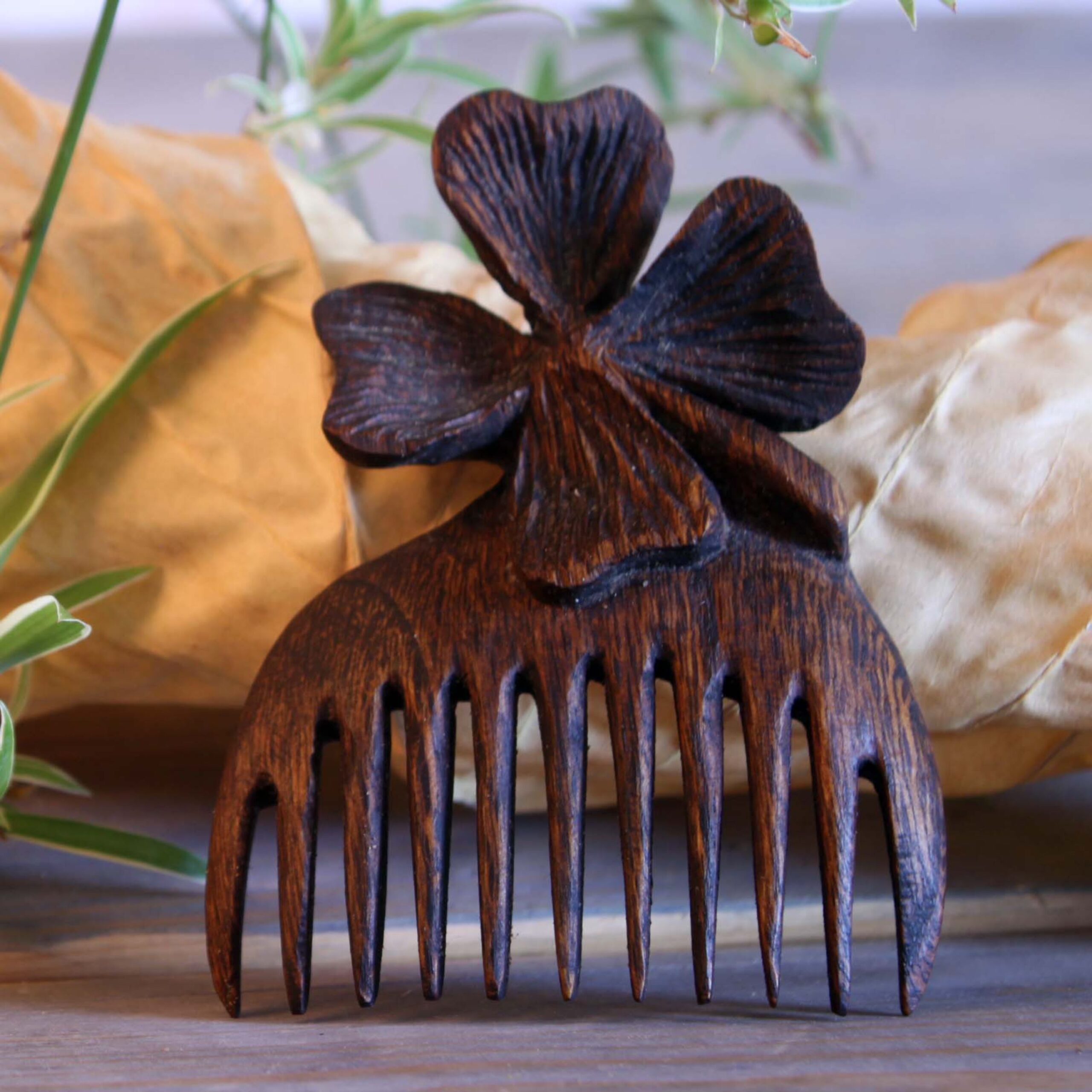 Price and Buy Hand Craved Wooden Clover Comb with Intricate Floral Engraving_6902224616c8a.jpeg Price and Buy Hand Craved Wooden Clover Comb with Intricate Floral Engraving - Image 1
