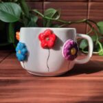 Price and Buy Handcrafted Embossed Floral Ceramic Mug – Fantasy Style with Raised Flower Design