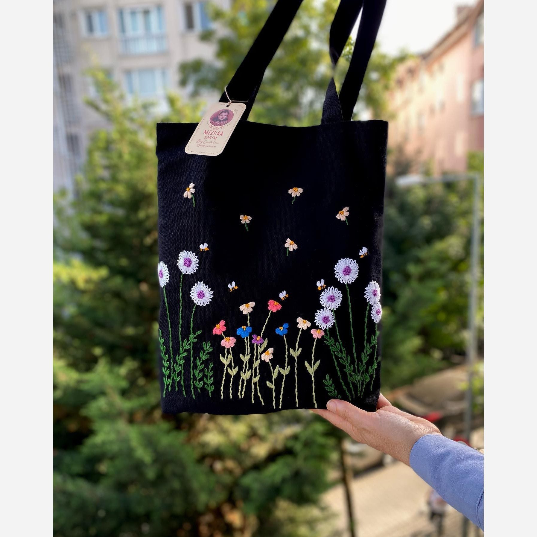 Price and Buy Handcrafted Embroidery Tote Bag – Black Canves with Floral Desing_6901f1354a107.jpeg Price and Buy Handcrafted Embroidery Tote Bag – Black Canves with Floral Desing - Image 1
