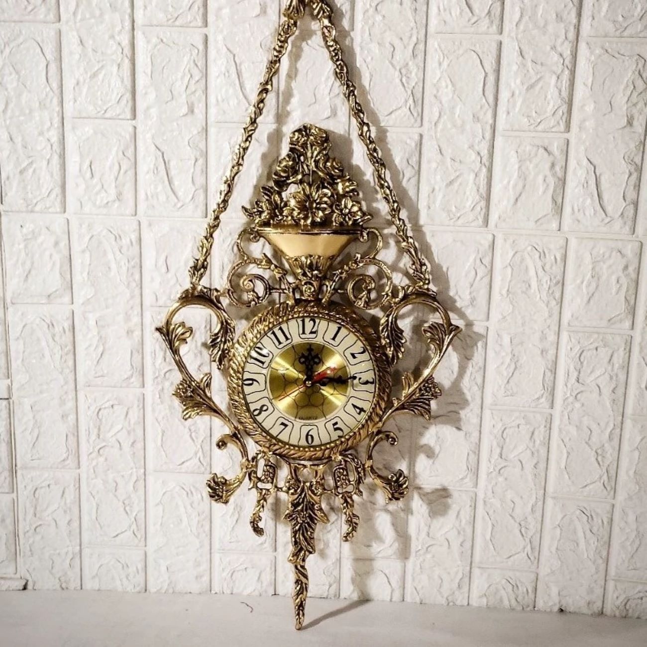 Price and Buy Large Brass Hanging Wall Clock with Brass Floral Pendant_6902eeedf2873.jpeg Price and Buy Large Brass Hanging Wall Clock with Brass Floral Pendant - Image 1