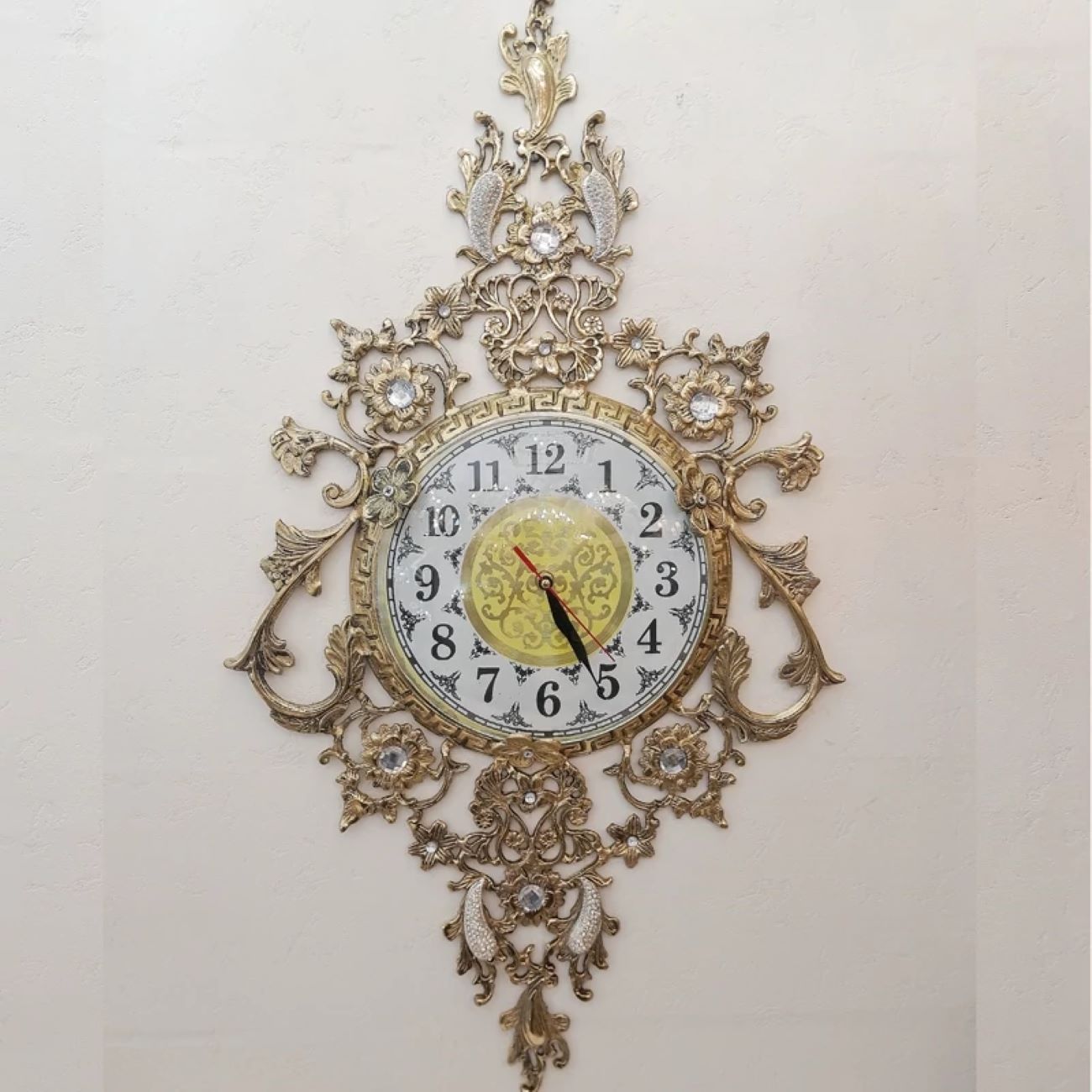 Price and Buy Luxurious Brass Wall Clock Featuring a Delicate Floral Hanging Accent_6902ef0d23e91.jpeg Price and Buy Luxurious Brass Wall Clock Featuring a Delicate Floral Hanging Accent - Image 1