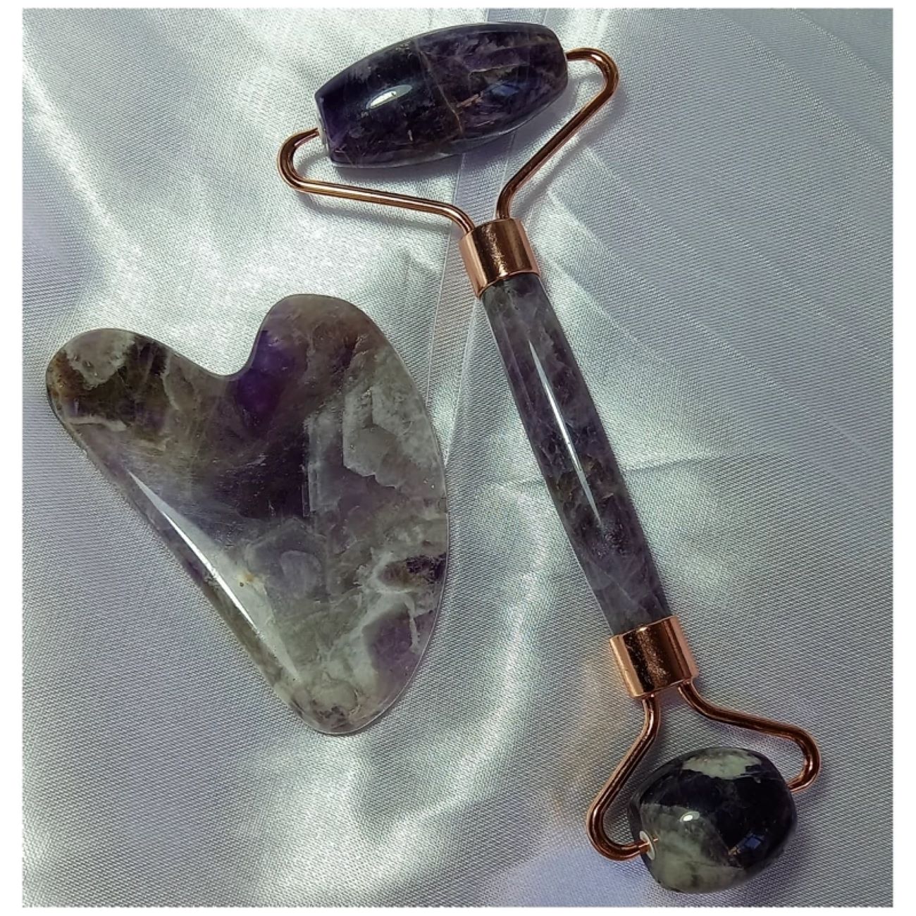 Price and Buy Natural Amethyst Facisal Roller Stone Massage Set with Gua Sha_6902ad2a124f0.jpeg Price and Buy Natural Amethyst Facisal Roller Stone Massage Set with Gua Sha - Image 1