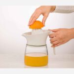 Price and Buy Pastel Pink Hand Juicer – Plastic Manual Citrus Press for Daily Use