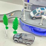 Price and Buy Police Suitcase Parking Playset 8-Piece– Includes 2 Die-Cast Police Cars & Rescue Helicopter - Image 5