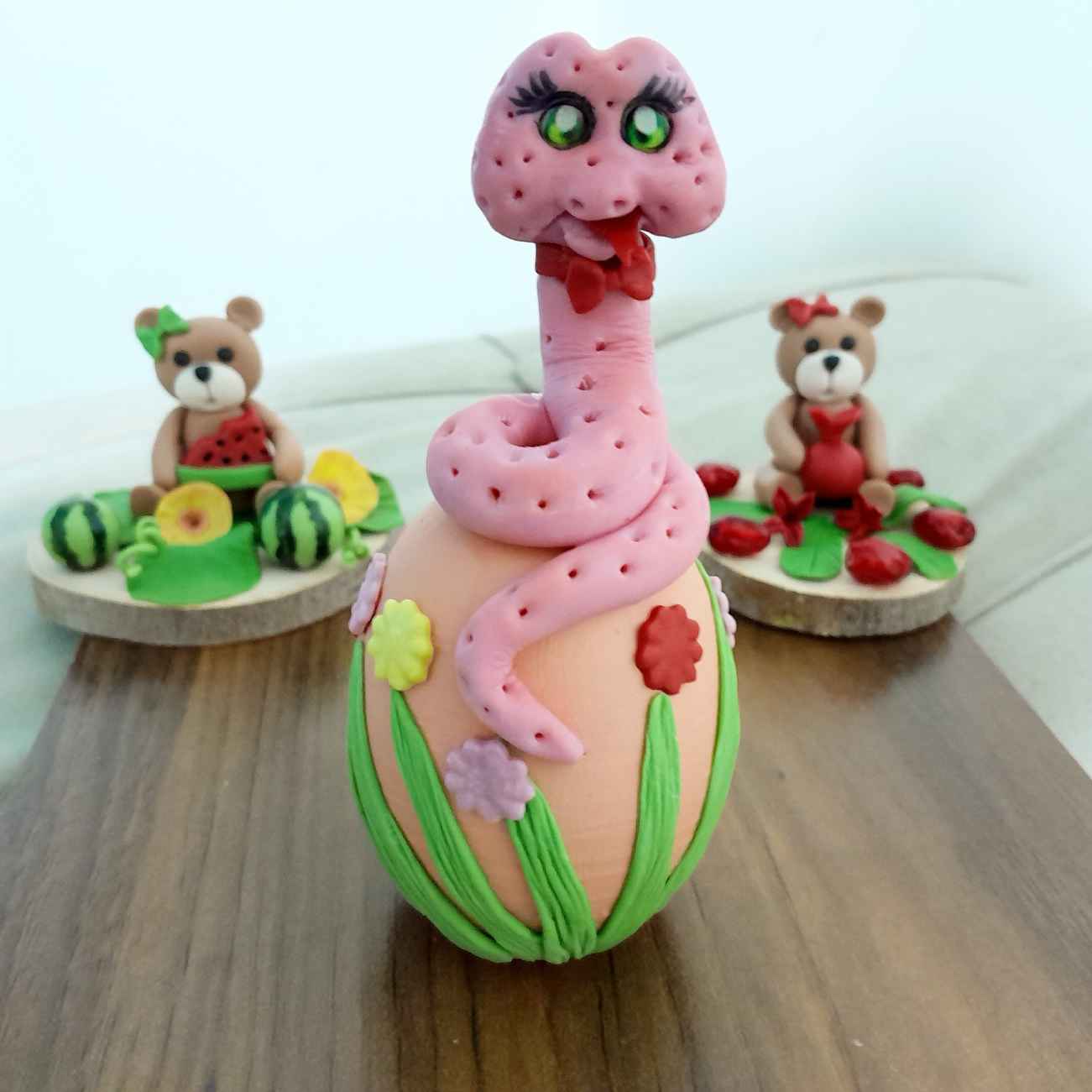 Price and Buy Pottery Doll – Perfect for Nowruz and Haft-Sin Celebration with Snake Design (Set of 2)_69024ebc9eef0.jpeg Price and Buy Pottery Doll – Perfect for Nowruz and Haft-Sin Celebration with Snake Design (Set of 2) - Image 1