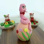 Price and Buy Pottery Doll – Perfect for Nowruz and Haft-Sin Celebration with Snake Design (Set of 2) - Image 3