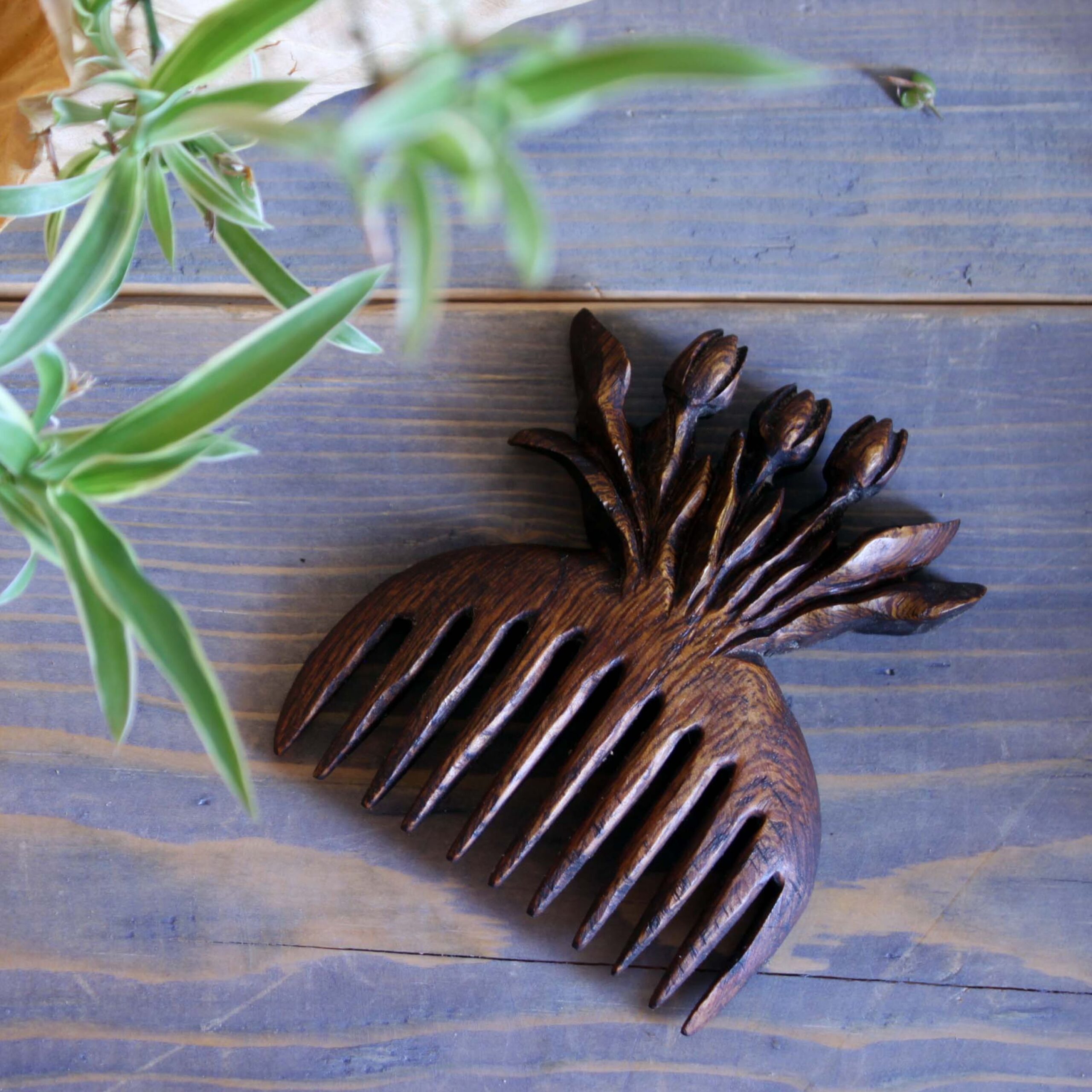 Price and Buy Rustic Hand-Carved Wooden Comb with Floral Tulip Design_6902230bc931c.jpeg Price and Buy Rustic Hand-Carved Wooden Comb with Floral Tulip Design - Image 1