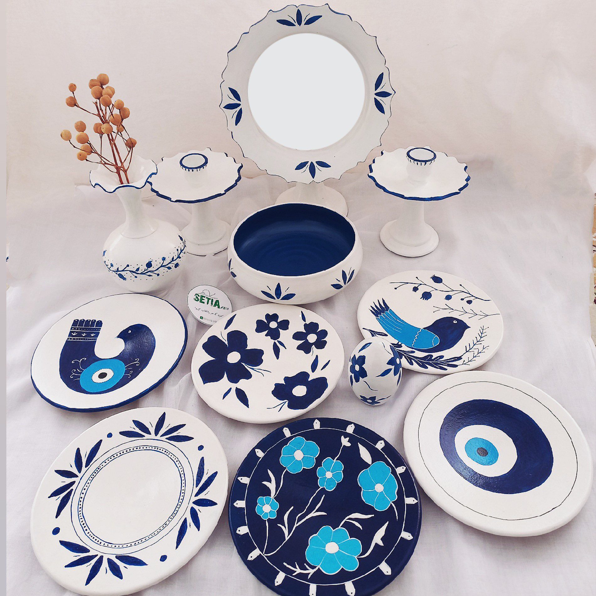 Price and Buy Symbolic Beauty A Hand-Painted Haft Seen Set with Floral, Bird & Evil Eye Motifs Set of 12_69021e15dffe7.jpeg Price and Buy Symbolic Beauty A Hand-Painted Haft Seen Set with Floral, Bird & Evil Eye Motifs Set of 12 - Image 1