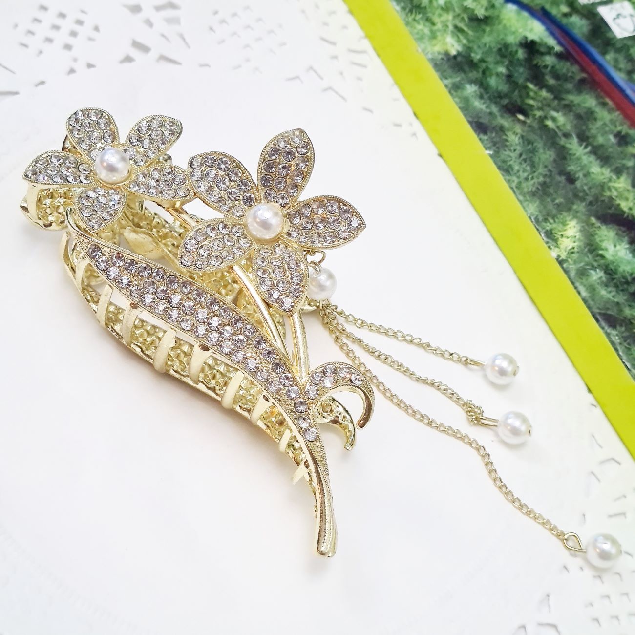 Price and Buy Women’s Hair Claw – Metal Five-Petal Flower Design with Dangle Charm_6903220aa4246.jpeg Price and Buy Women’s Hair Claw – Metal Five-Petal Flower Design with Dangle Charm - Image 1